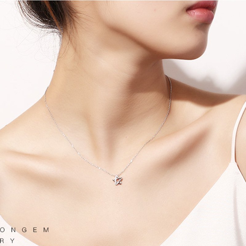 Hollow five-pointed star pendant female Japanese version simple pendant 925 silver jewelry gift